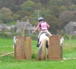 Ruth and Dom opening a gate. To score 10 you must keep hold of the gate and the horse should be calm and responsive.